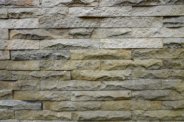 Neatly arranged natural stone wall background
