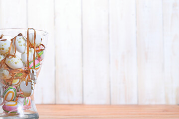 Happy Easter background in the pastel color and on the wood which you can use for greetings card
