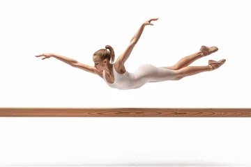 Foto auf Acrylglas Portrait of teenage girl practicing rhythmic gymnastics in gym over white background © boyhey