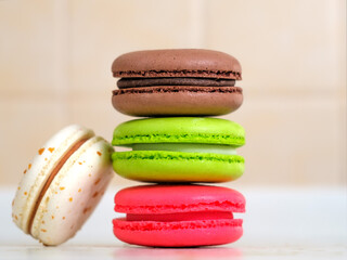 Macaron cake on kitchen background, colorful dessert
