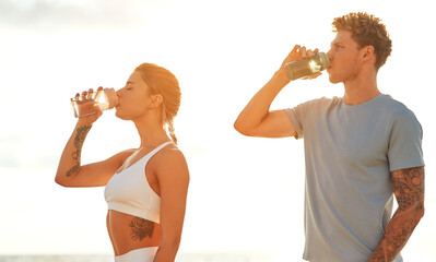 Young couple doing sports outdoors