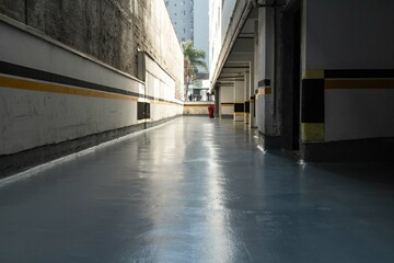 Construction and painting of parking garage floor at a building