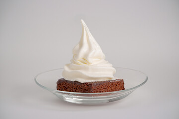 Yogurt soft ice cream gelato natural on top of a brownie