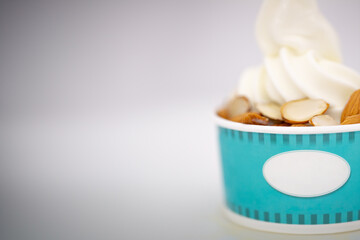 Yogurt soft ice cream gelato natural with almonds