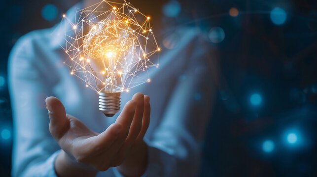 Businessman merging concepts of lightbulb and brain