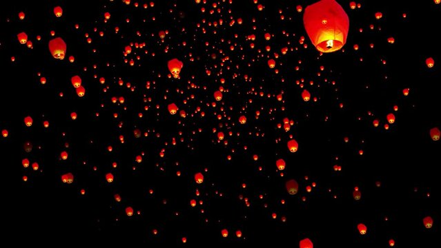 Lanterns animation isolated on black background. Floating lanterns animation in the sky. Flying Chinese Lanterns. flying lantern lights with flame at night sky.