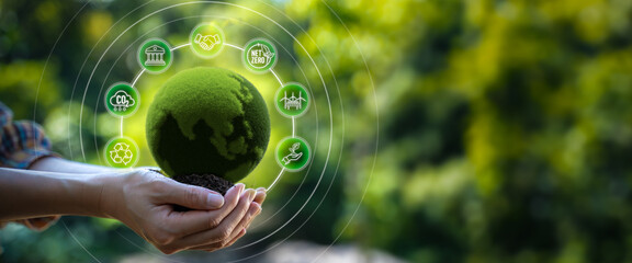 Hand holding green globe with network connection and ESG(environmental,social,governance),sustainable business,renewable resource to reduce pollution,Save world save life and Plant a tree concept. - obrazy, fototapety, plakaty