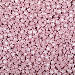 Colorful and bright cake decorations, in powder and granule form, can also be used as a colorful background.