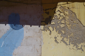 Romantic backstreet, side street and alleys in historic old town of Cartagena, Spain with historic Spanish style architecture facades, a landmark sightseeing tourist spot in downtown