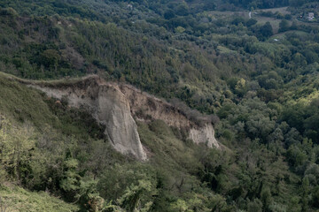 Landscape with gullies around Civita di Bagnoregio village in Italy