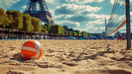 Close-up of an orange volleyball on sandy court in Paris, with Eiffel Tower in the background,...