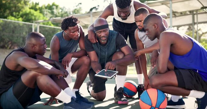 Basketball court, men and coach with a tablet, sports and game plan with digital app and technique. Players, athlete and team with technology and discussion with typing and planning with network