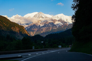 Mont Blanc above highway, highest mountain in Alps and Western Europe with elevation 4809 m,...