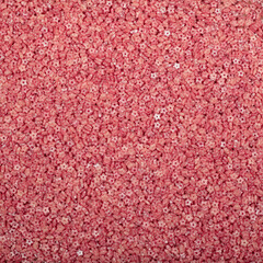 Colorful and bright cake decorations, in powder and granule form, can also be used as a colorful background.