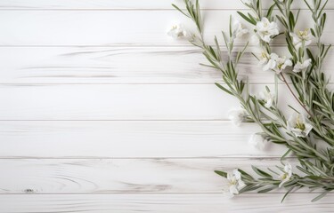 A collection of white flowers peacefully arranged on a sturdy wooden table.