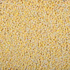 Colorful and bright cake decorations, in powder and granule form, can also be used as a colorful background.