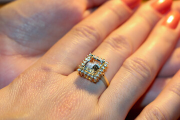 Woman Hand Ring. Hand With Ring. Blue Topaz Gold Ring Square Stone. Blue Gemstone