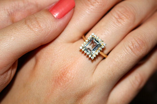 Woman Hand Ring. Hand With Ring. Blue Topaz Gold Ring Square Stone. Blue Gemstone