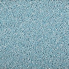 Colorful and bright cake decorations, in powder and granule form, can also be used as a colorful background.