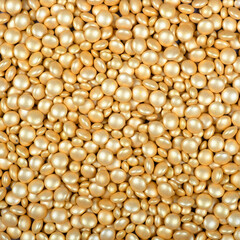 Colorful and bright cake decorations, in powder and granule form, can also be used as a colorful background.