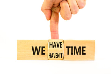 We have or not time symbol. Concept word We have or have not time on beautiful wooden cubes. Beautiful white table white background. Business and we have or not time concept. Copy space.