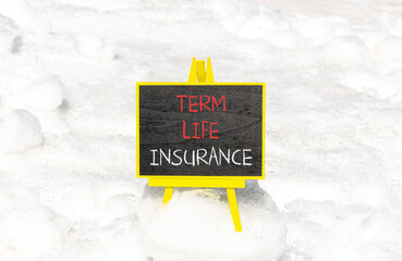 Term life insurance symbol. Concept words Term life insurance on beautiful black chalk blackboard....