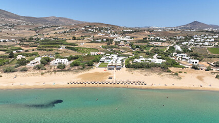 Aerial drone photo of famous for surfers sandy beach of Chrysi Akti or Golden beach with crystal...