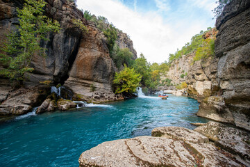 Transparent waters of Kopru River (Köprüçay, ancient Eurymedon) with its emerald green colour in Koprulu Canyon (Köprülü Kanyon) National Park, Antalya, Turkey. It's a rafting paradise