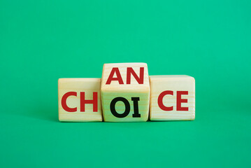 Chance and Choice symbol. Wooden cubes with words Choice and Chance. Beautiful green background. Chance and Choice and business concept. Copy space
