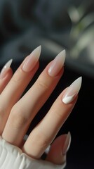 Beautiful painted nails close-up. Fashionable nail extensions with French design