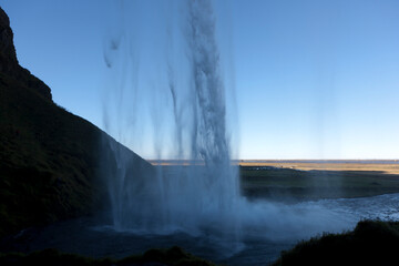 Iceland. Skóugafoss waterfall on a sunny summer day.