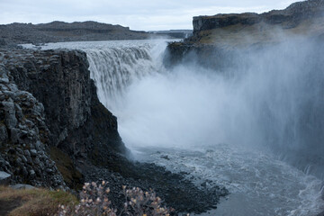 Iceland Detifoss waterfall on a cloudy summer day.