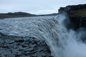 Iceland Detifoss waterfall on a cloudy summer day.