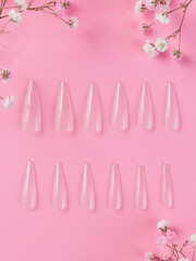 Step-by-step instructions for nail extension on gel tips. Manicure, hands in the foreground. Pink background. Copy space
