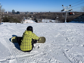 Snowboarder Sitting Top of Hill, Winter Sports and Recreation Activity