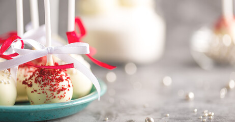 Sweets for Valentine's Day. Round candies with red velvet. Festive background