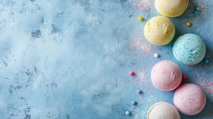 Bath bombs on concrete background with copy space, multicolored pastel collection, banner for natural handmade cosmetics stores - obrazy, fototapety, plakaty