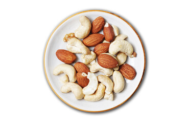 Almonds isolated on white. Tapas nuts serving. White plate with nuts. Pile of cashew nuts. Healthy snack portion. Closeup macro almonds structure.