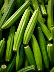 Obraz premium Top view background with fresh green okras