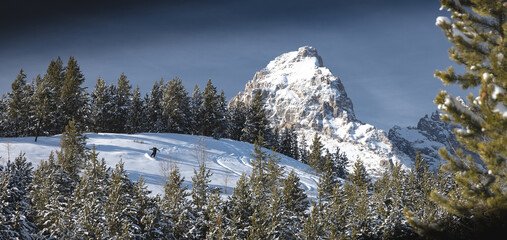 Snowboarding with Grand Teton Backdrop