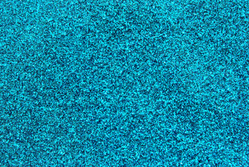 Blue color glitter paper texture close up as background