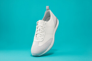 Casual fashion comfortable white shoes with leather accent. Seasonal sales or discounts on shoes....