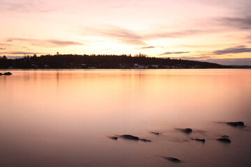 sunrise over calm water - Lysaker