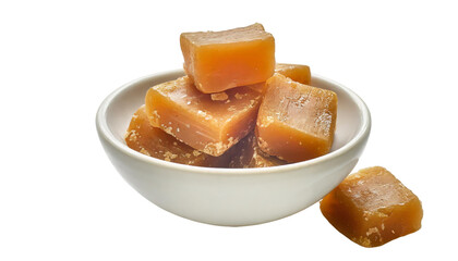 Brown sugarcane cubes in a white bowl isolated on transparent background. - obrazy, fototapety, plakaty