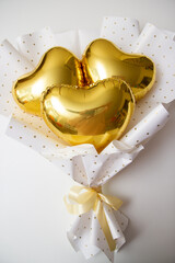 bouquet of gold foil hearts, heart balloons in a bouquet