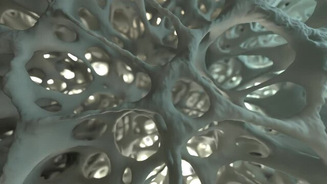 Camera explores the macro world of healthy spongy bone tissue in 3D animation, akin to an electron microscope view.