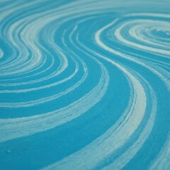 Fototapeta na wymiar a blue surface has swirl patterns