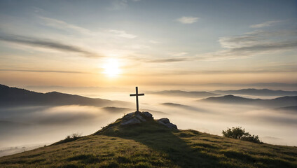 Naklejka premium Krzyż na wzgórzu o wschodzie słońca