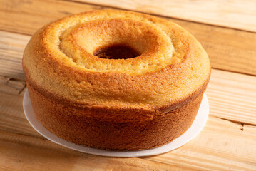 Orange cake, beautiful orange cake and accessories on rustic wood, selective focus.