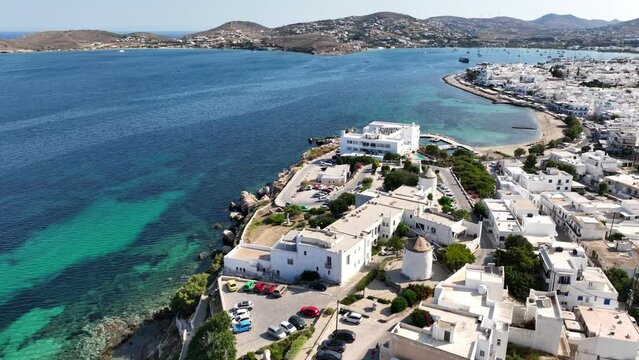 Aerial drone video of traditional settlement of Paroikia with unique Cycladic architecture, Paros island, Cyclades, Greece